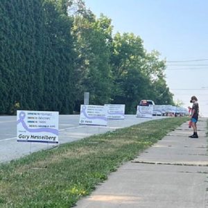 signs lining the road for the Run for Hope event
