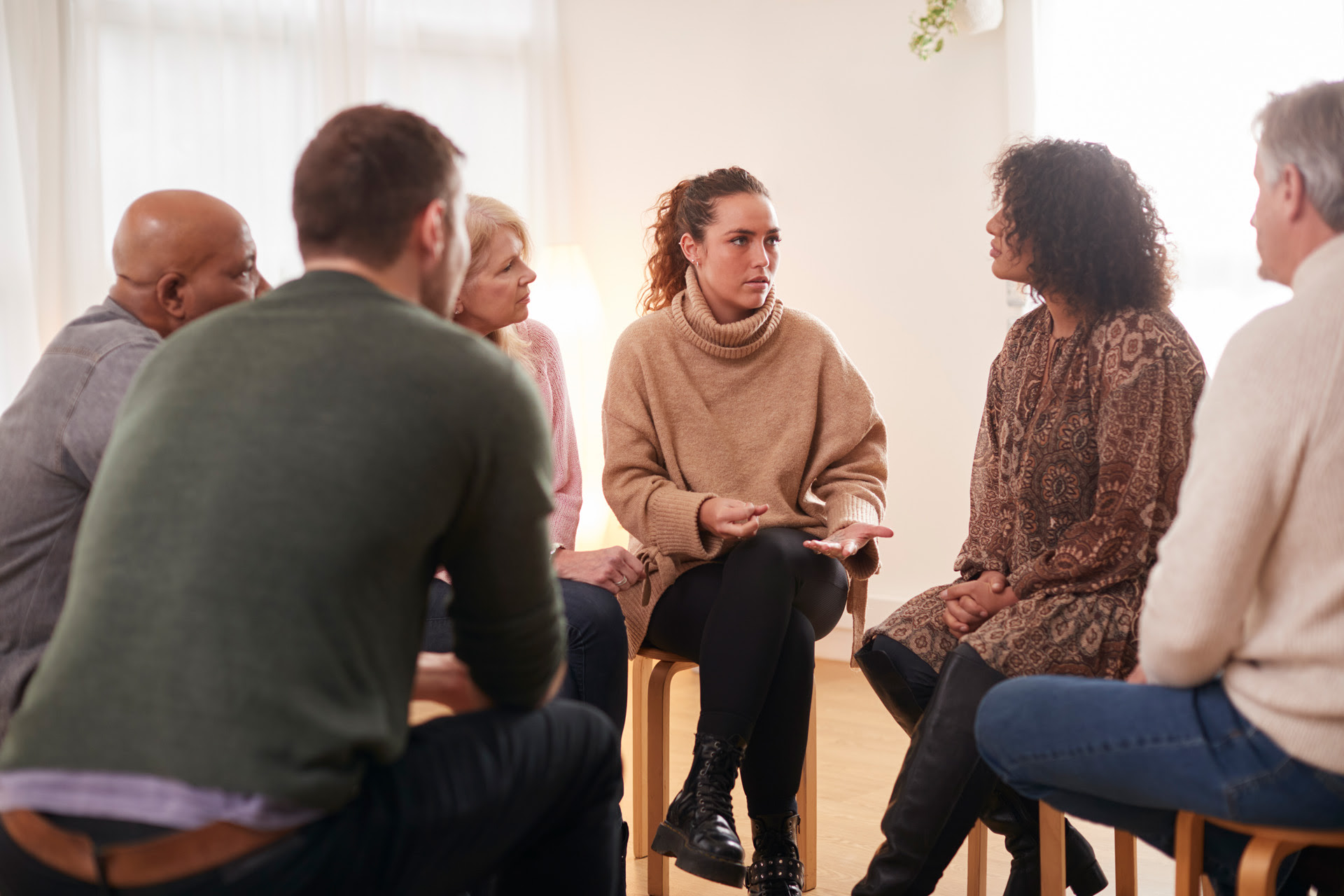 woman speaking at support group